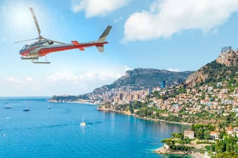Helicopter flying along the coast towards Monaco